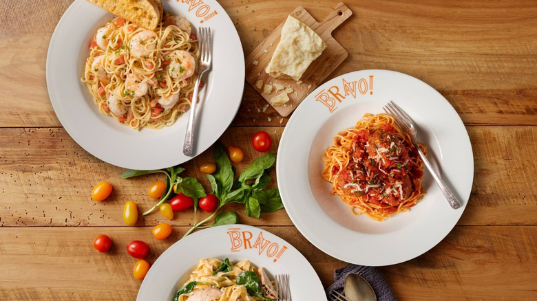 Three pasta dishes served by Bravo Italian Kitchen