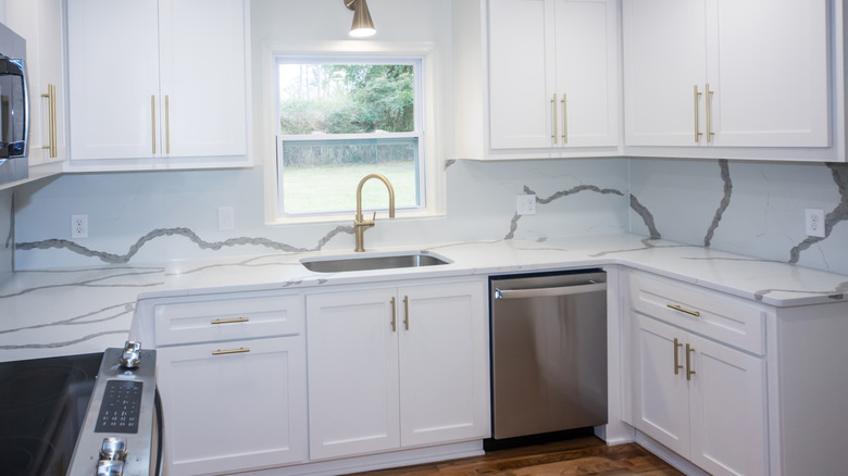 White quartz countertops in small kitchen