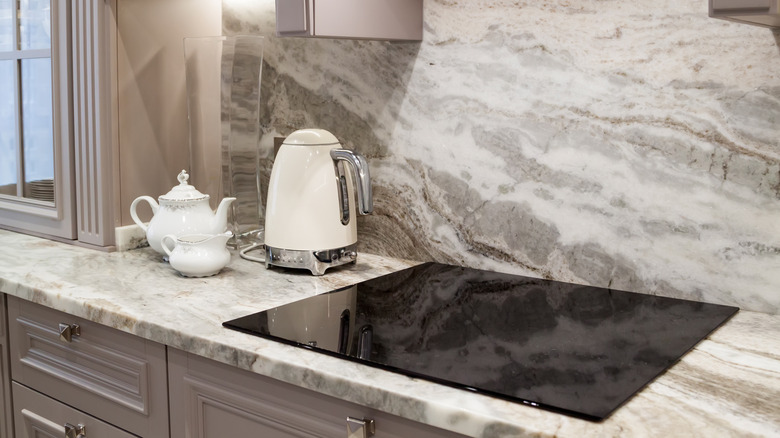 Quartz countertops designed to look like marble with kitchen range