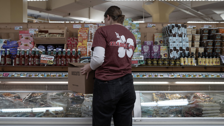 Trader Joe's working in the freezer section at the store