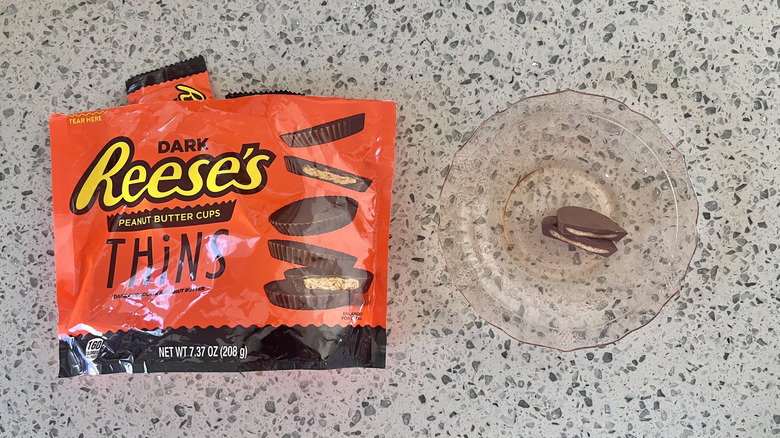 Dark chocolate Reese's thin cut in half