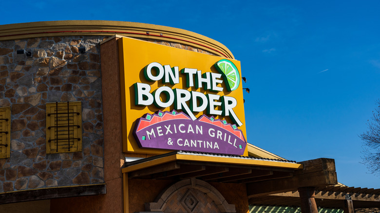 On The Border Mexican Grill & Cantina sign in yellow outside restaurant