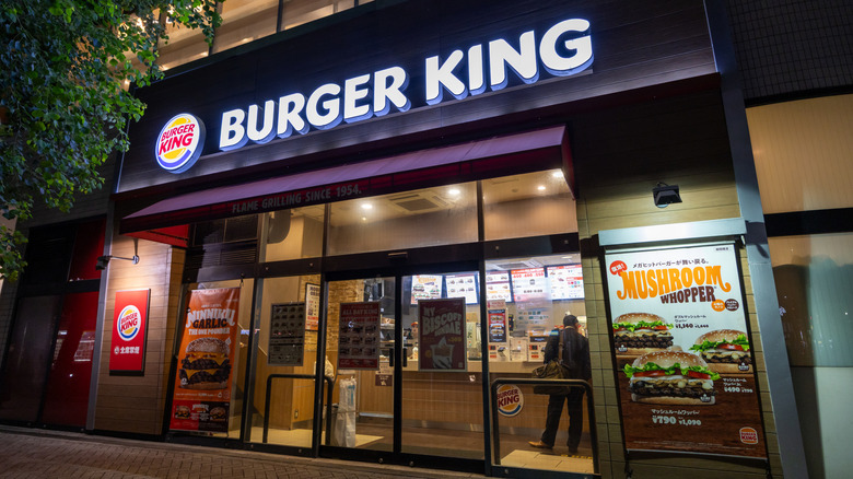 An urban Burger King exterior at night