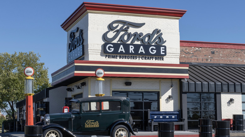 Vintage car parked outside a Ford's Garage restaurant