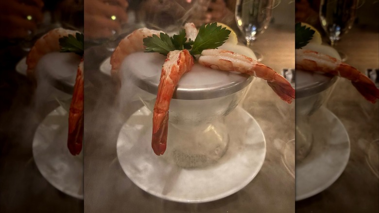 Shrimp cocktail with sauce on dry ice at Ocean Prime