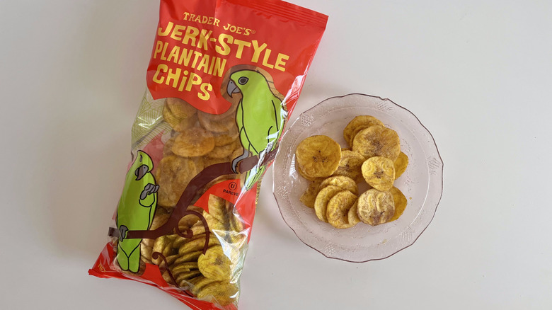 Jerk style plantain chip pieces on a small plate