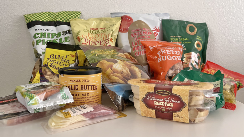 Various salty snacks from Trader Joe's on a table