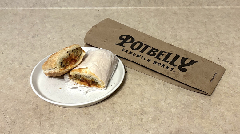 Potbelly mama's meatball sandwich on white plate and neutral counter.