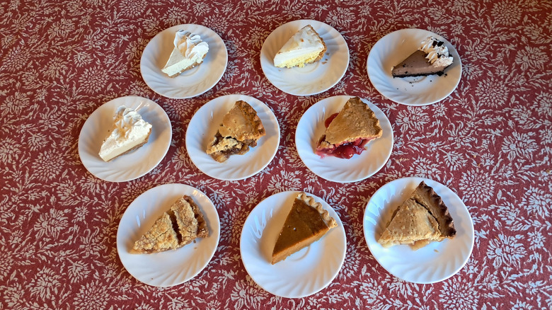 nine slices of pie on table