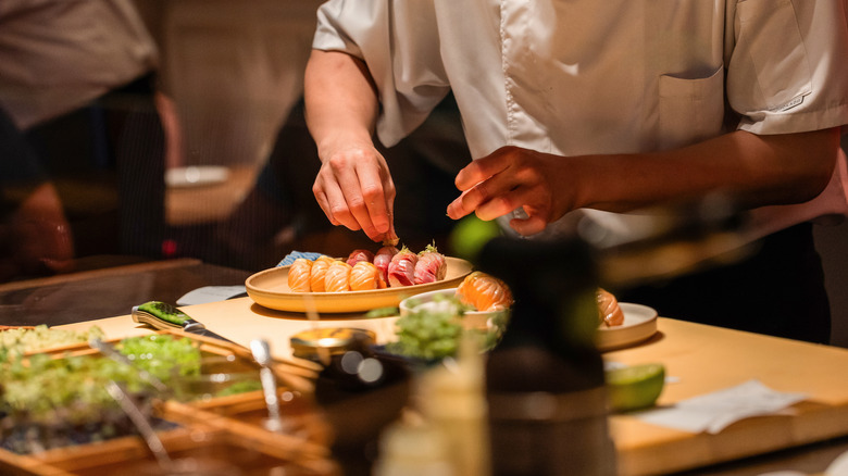 Chef preparing sushi at a restaurant