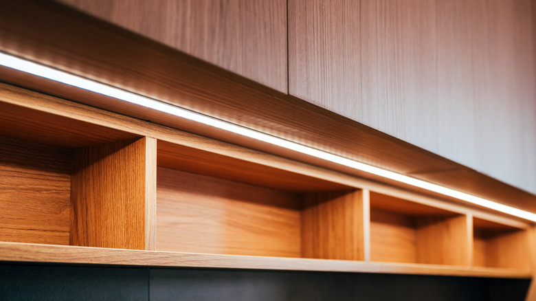kitchen cabinets with LED strip lighting underneath