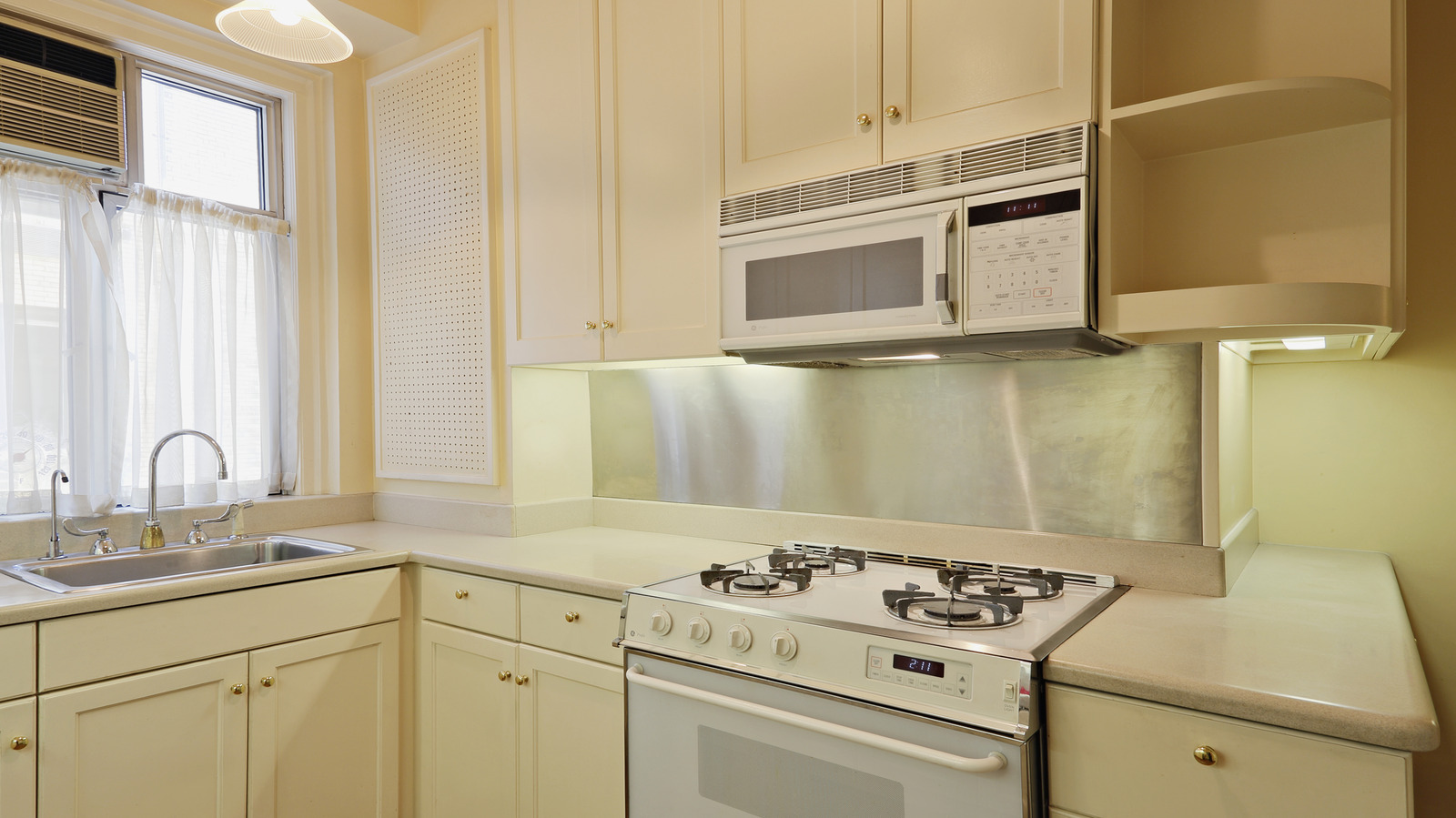 9 Small Changes That Make Tired Kitchen Cabinets Feel New Again - Tasting Table