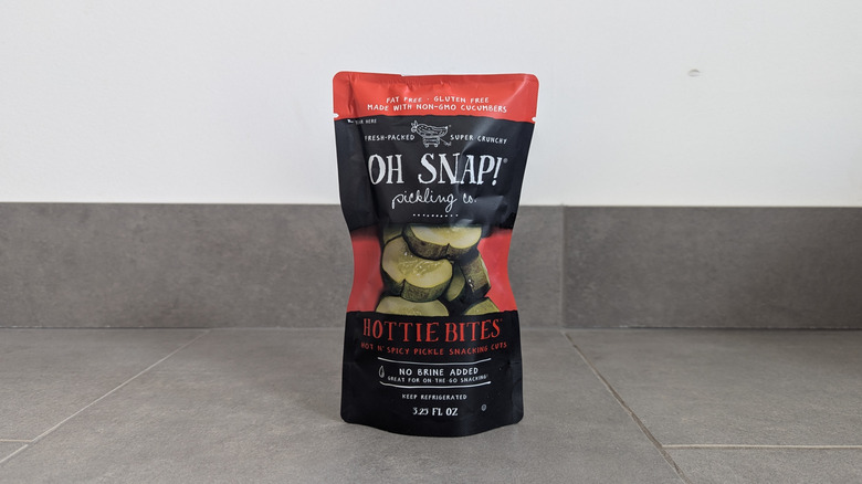 Black and red pouch of Oh Snap! pickle chips