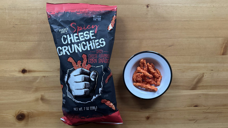 Trader Joe's Spicy Cheese Crunchies on wooden table