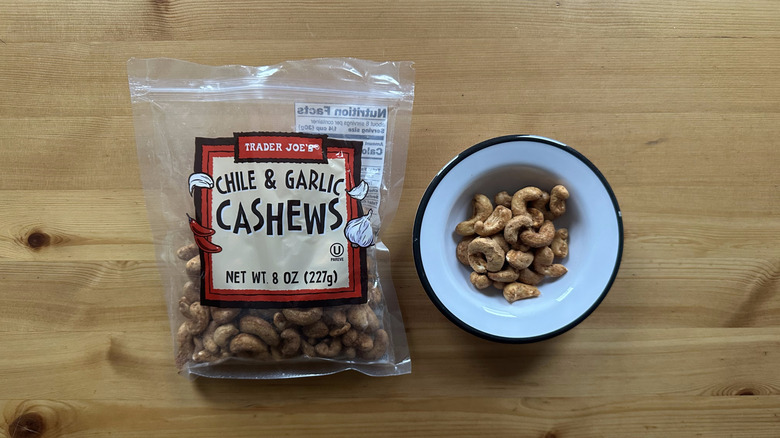 Trader Joe's Chile and Garlic Cashews on wooden table
