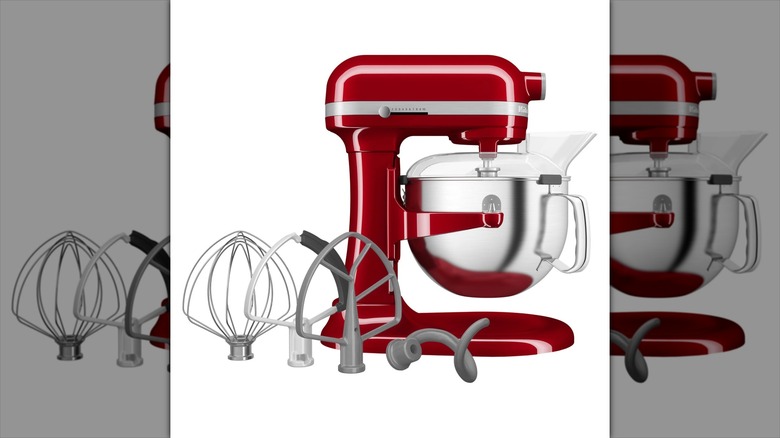 Red KitchenAid 6-quart bowl-lift stand mixer with attachments and pouring shield
