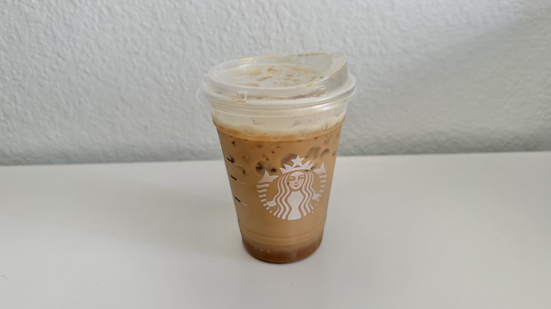 Iced Pumpkin Pie Shaken Espresso in a Starbucks cup