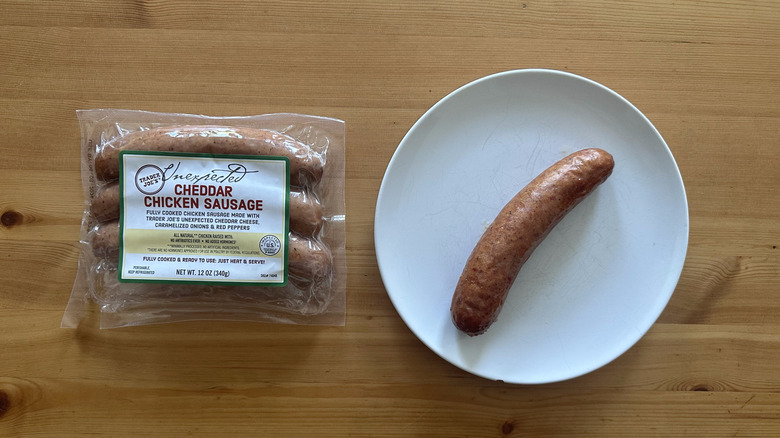 Trader Joe's Unexpected Cheddar Chicken Sausage on wooden table