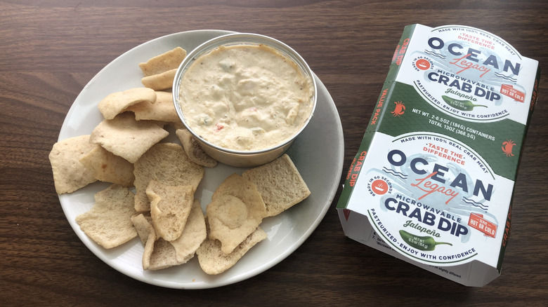 Ocean Legacy Jalapeño crab dip on plate with pita chips.