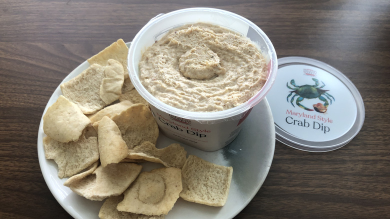 Inland Market Maryland style crab dip on plate with pita chips.
