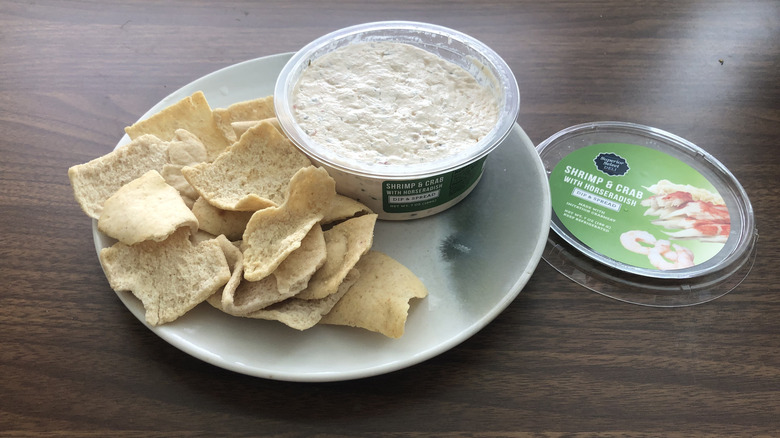 Superior Select Deli Shrimp and Crab dip on plate with pita chips.