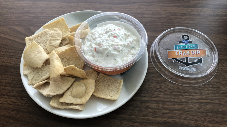 Kroger Traditional Crab dip on plate with pita chips.