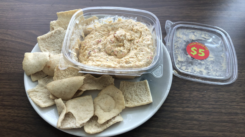 Giant Eagle Cajun Crab dip on plate with pita chips.