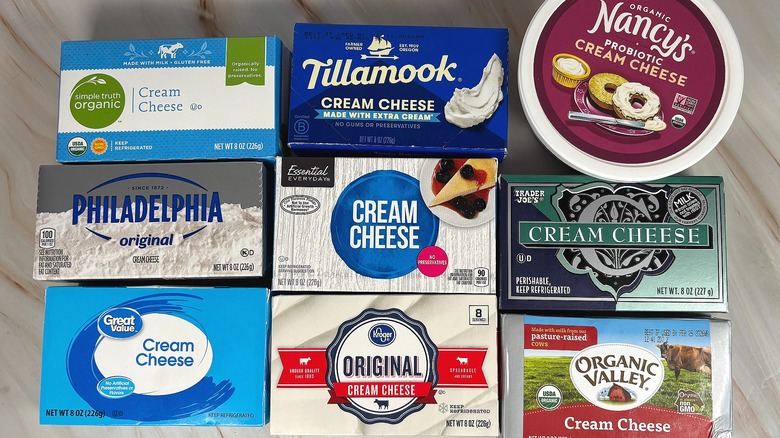 Top-down shot of nine cream cheeses on table