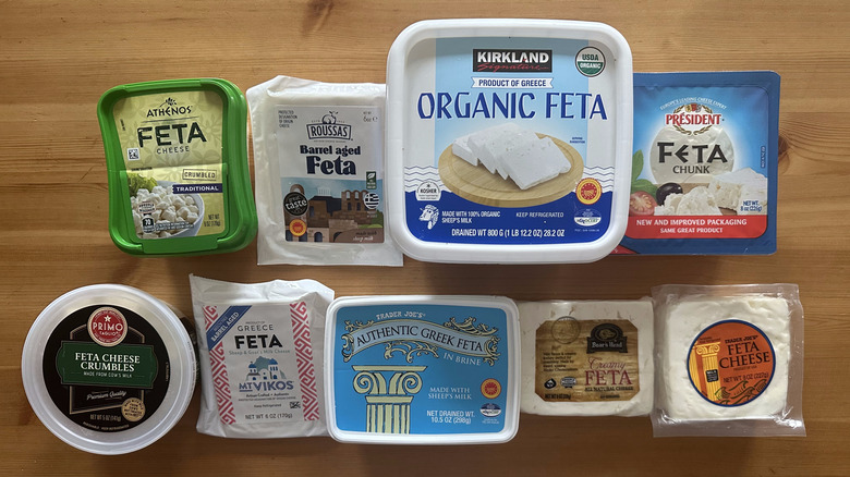Store-bought feta in packaging on wooden table