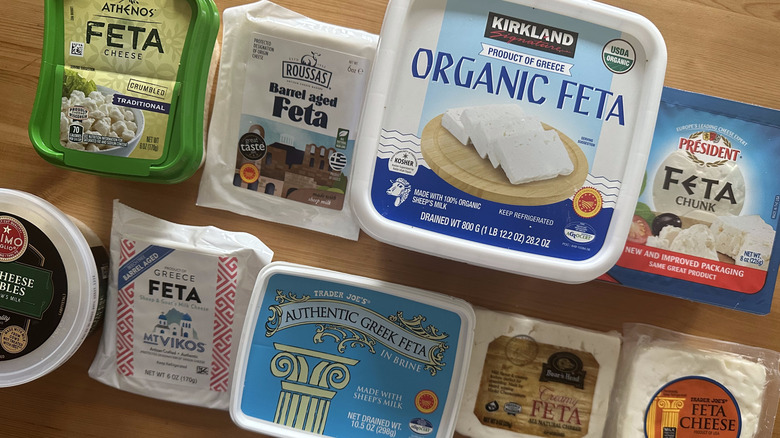 Store-bought feta in packaging on wooden table