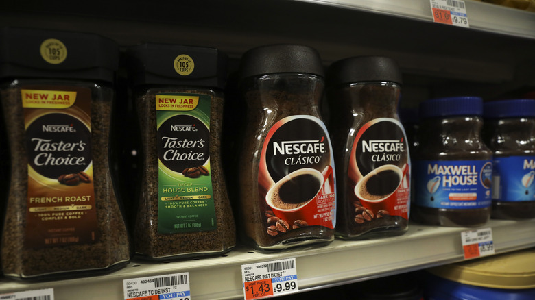 Nestle's Nescafe coffee products sit on the shelf