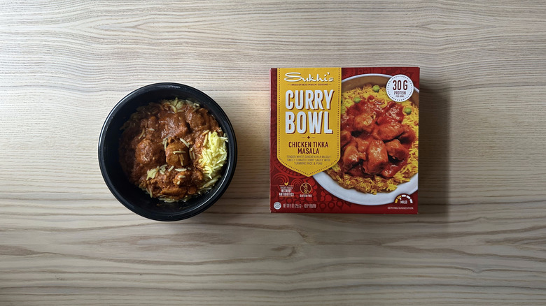 Sukhi's Chicken Tikka Masala Curry Bowl on wooden table