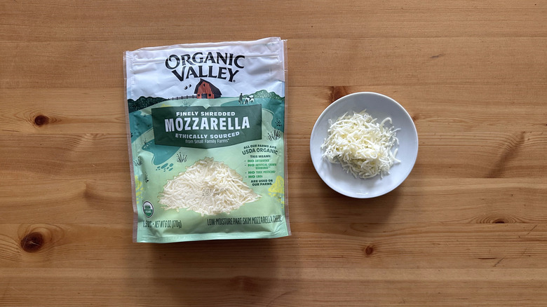 Organic Valley Finely Shredded Mozzarella Cheese on wooden table