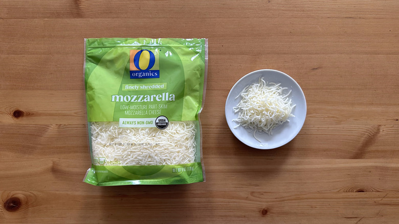 O Organics Finely Shredded Mozzarella Cheese on wooden table