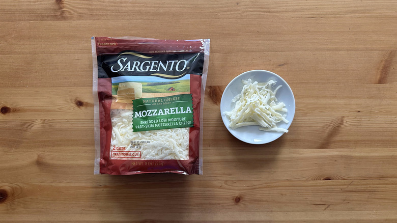 Sargento Shredded Mozzarella Cheese on wooden table