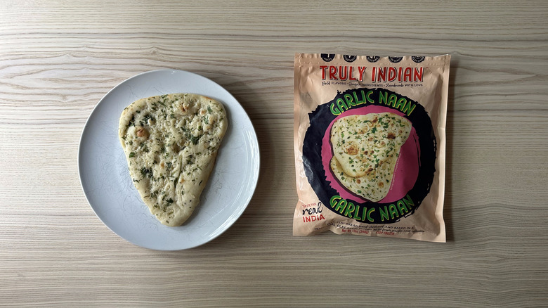 Truly Indian Garlic Naan on white plate