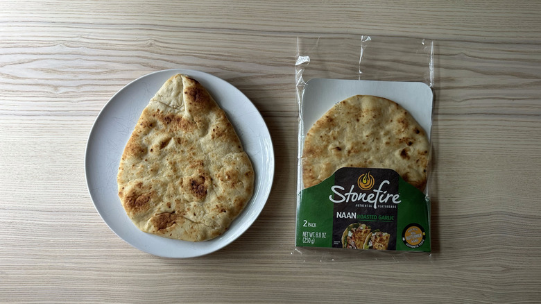 Stonefire Roasted Garlic Naan on white plate