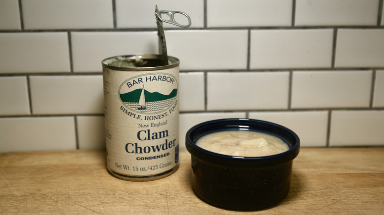 can of chowder with bowl