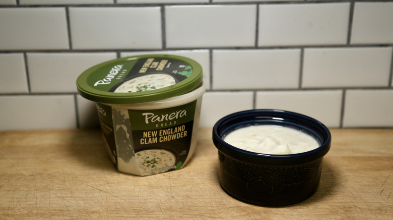 container of chowder with bowl