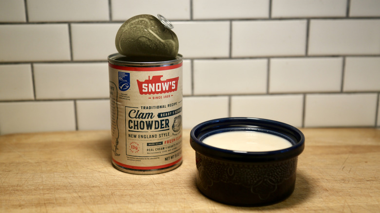 can of chowder with bowl