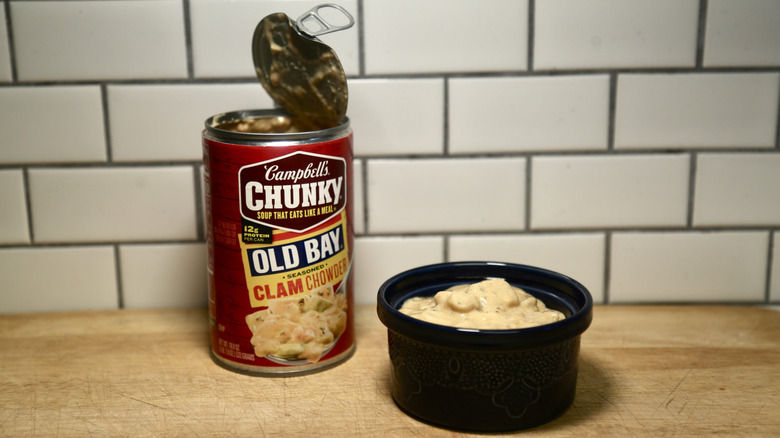 Can of chowder with bowl