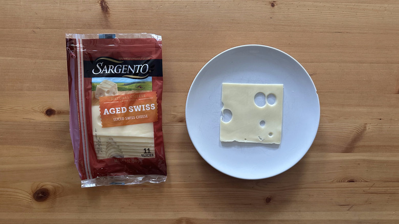 Sargento Aged Swiss on wooden table