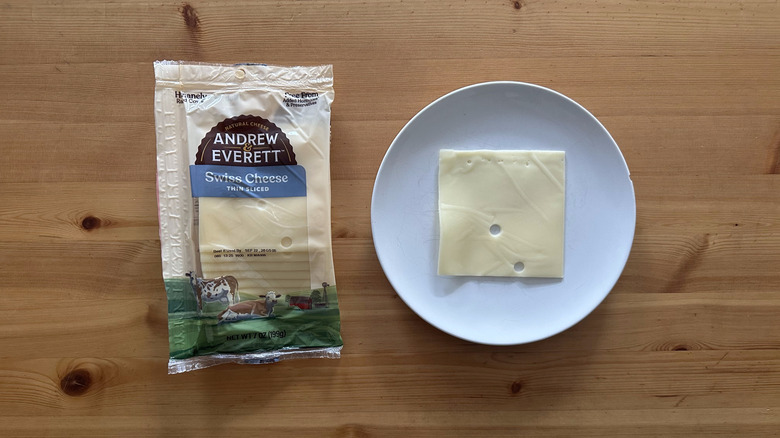 Andrew and Everett Swiss Cheese on wooden table