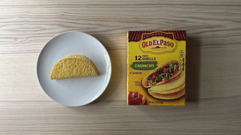 Old El Paso Crunchy Taco Shells box and a plate on wooden table