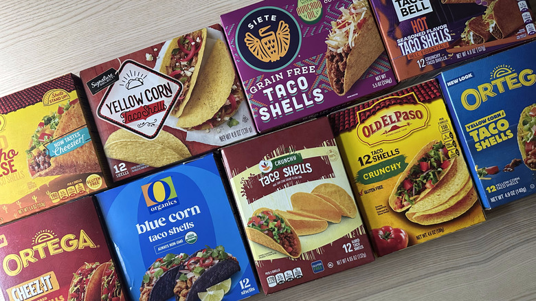 Taco shell boxes arranged on wooden table