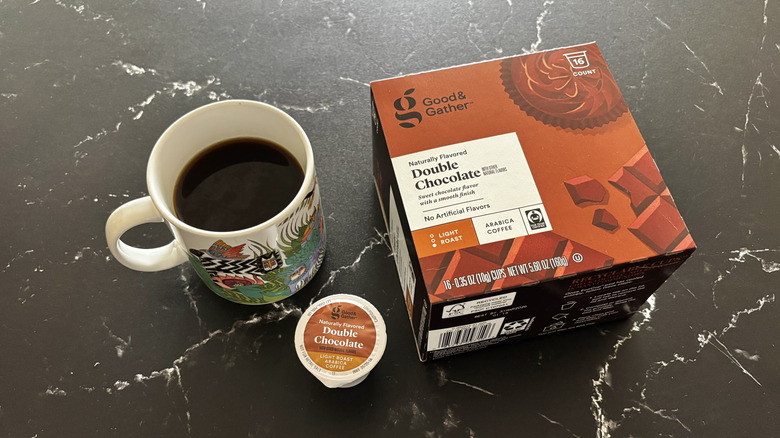 Cup of coffee, coffee pod, and Good & Gather double chocolate coffee pod box
