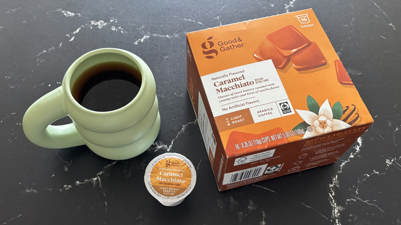 Cup of coffee, coffee pod, and Good & Gather caramel macchiato coffee pod box