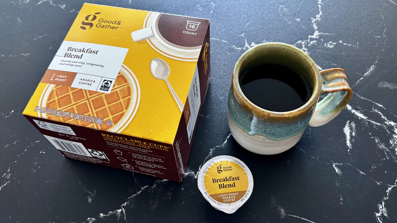 Good & Gather breakfast blend coffee pod box, coffee pod, and cup of coffee