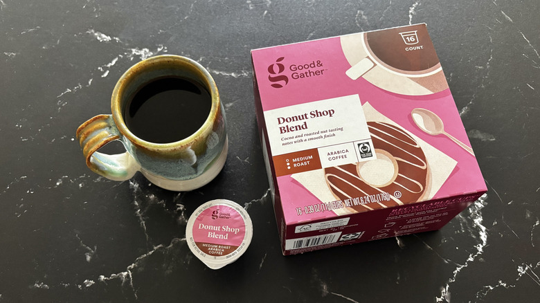 Cup of coffee, coffee pod, and Good & Gather donut shop blend coffee pod box