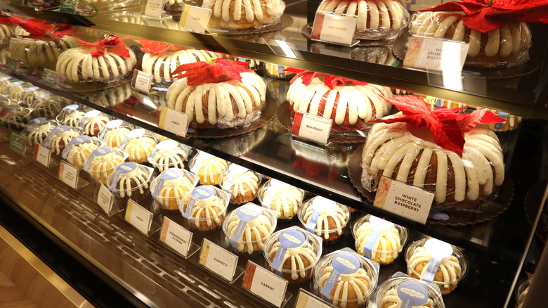 Nothing Bundt Cakes display case featuring large cakes